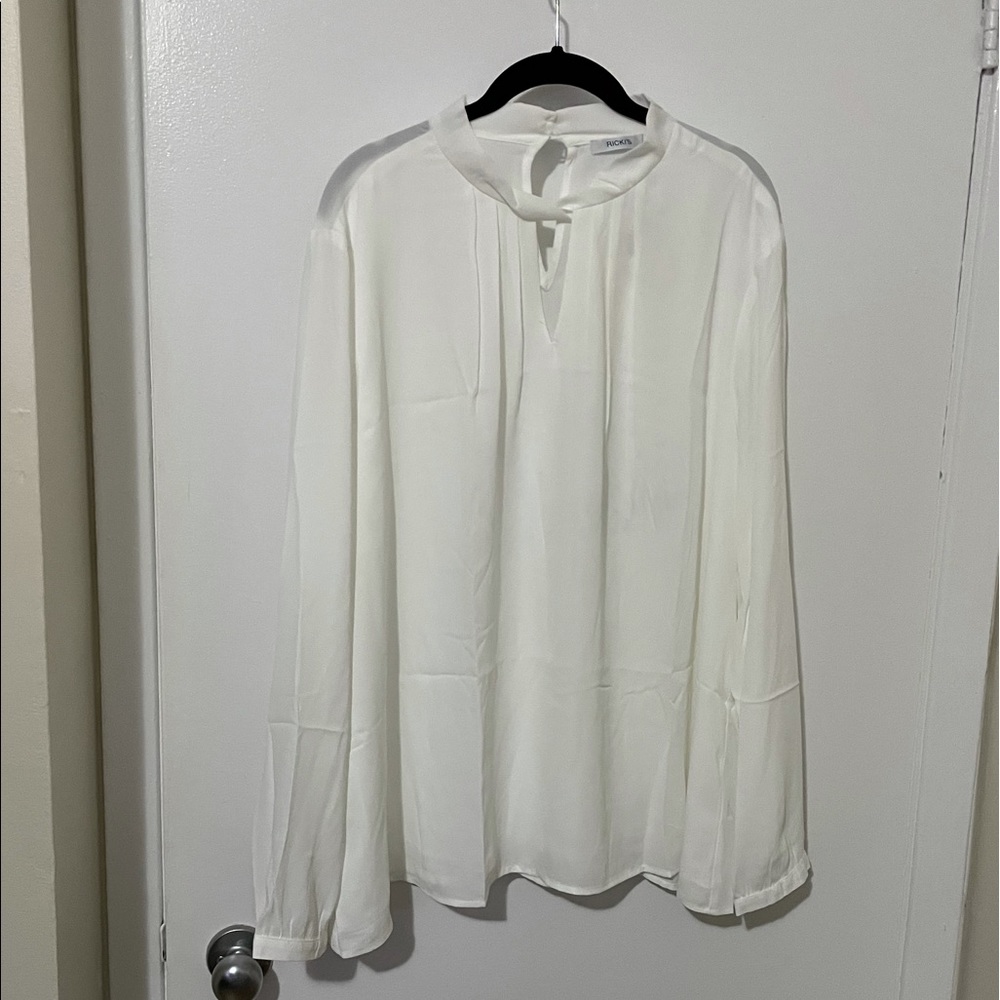 Ricki’s Long Sleeve Twisted Keyhole Blouse